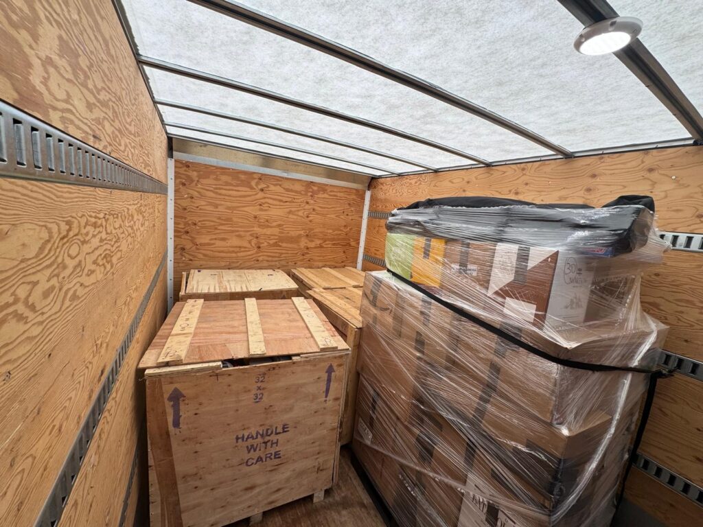 How to pack for a move: carefully packed household items in moving boxes